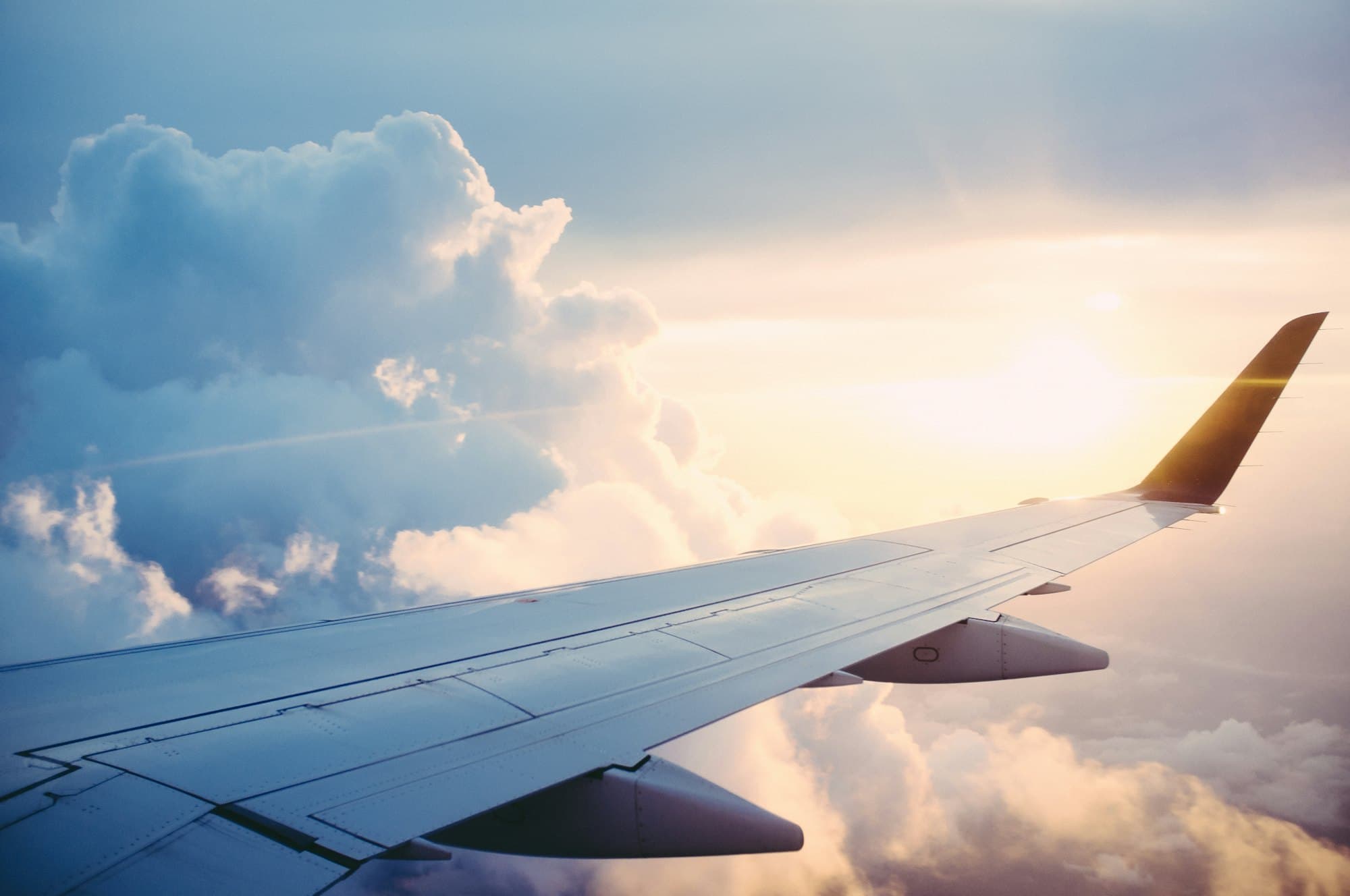 Airplane Cabin: Above the clouds at golden hour